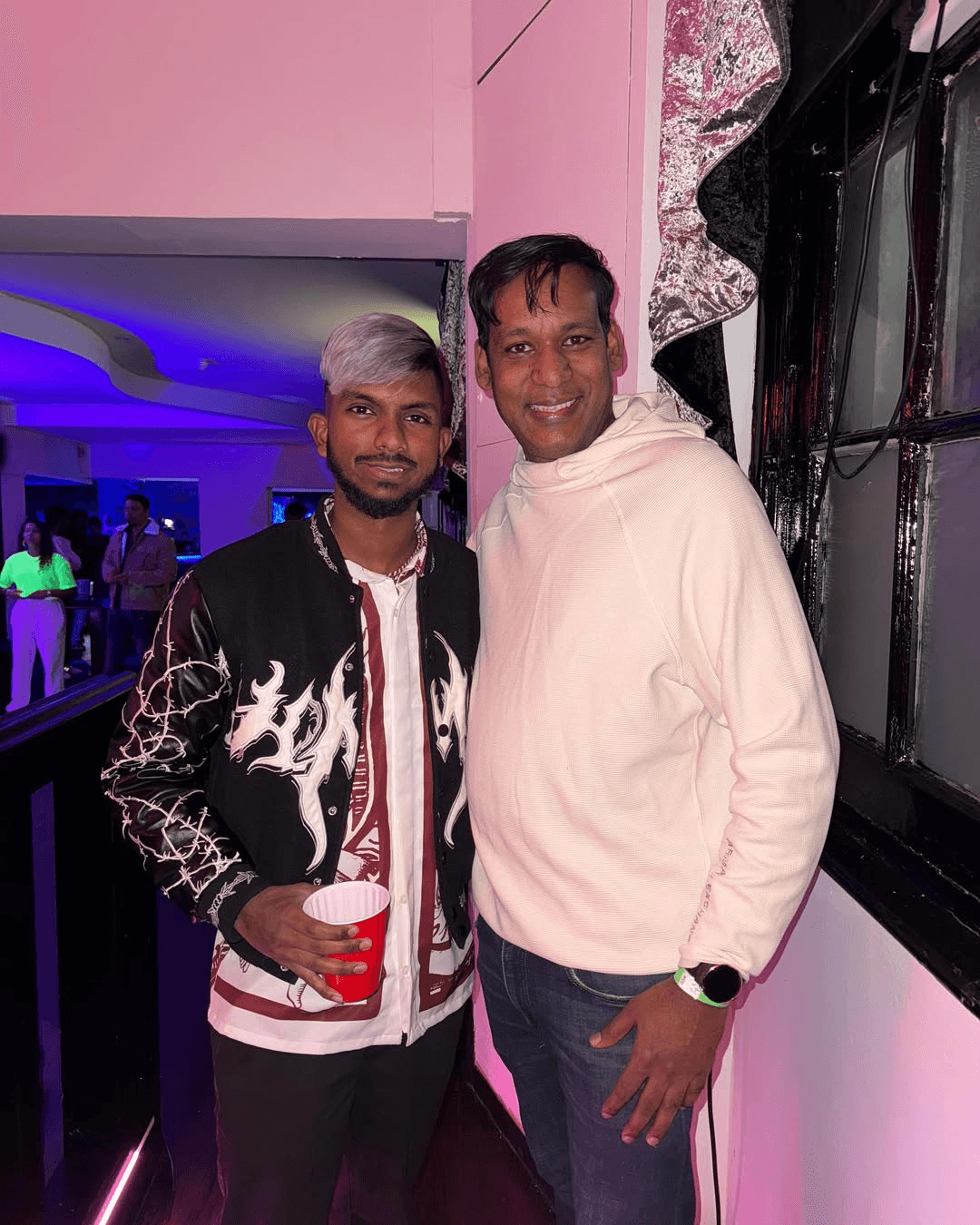 DJ Dolphin with guest at a late-night club event