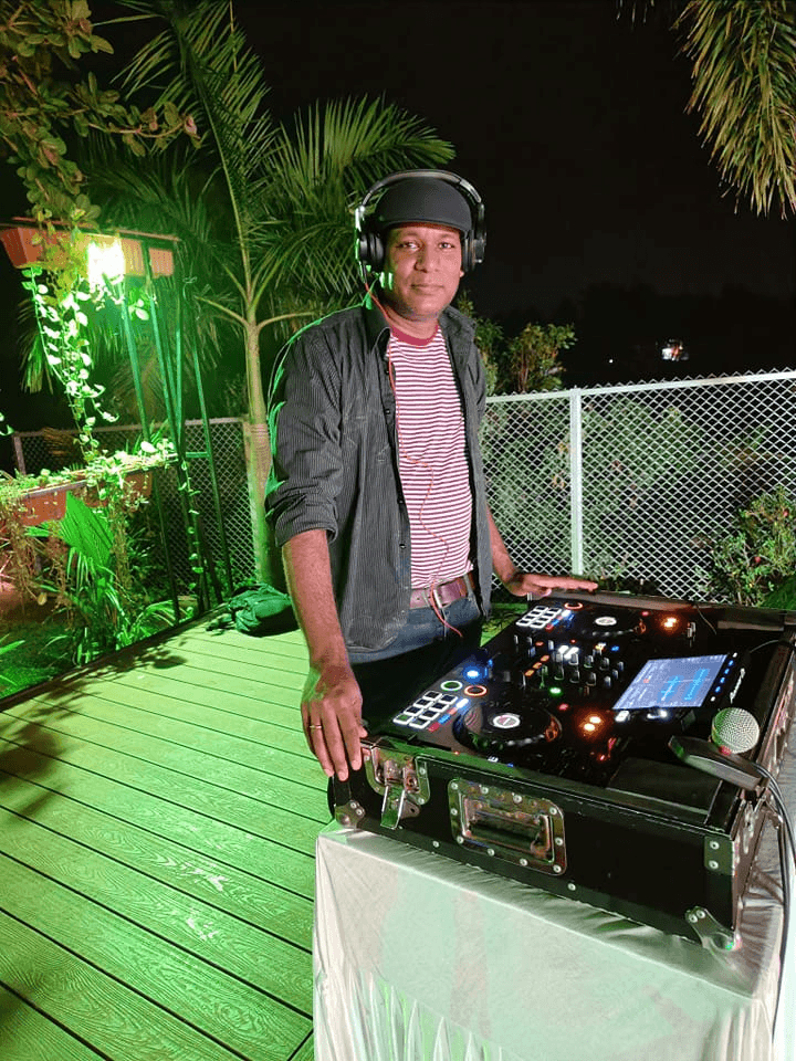 DJ Dolphin at a night rooftop set in Goa